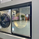 松下(Panasonic)镜面一体机门10公斤洗烘一体滚筒洗衣机玻璃面板纳诺怡光动银除菌除螨智能洗涤 XQG100-SD128